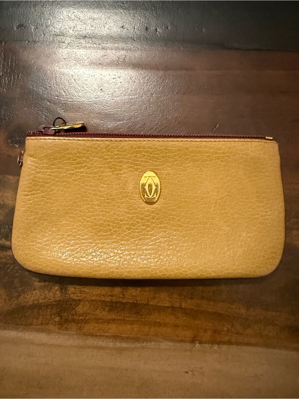Cartier Yellow-Tan Leather Zip Wristlet with Gold Emblem